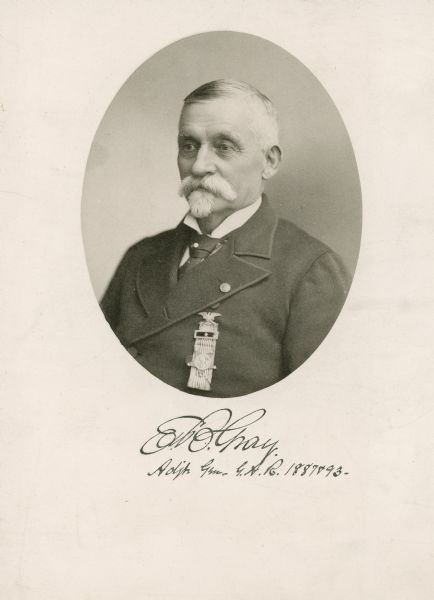 Quarter-length oval framed portrait of Edmund Gray, wearing a military medal on his jacket.