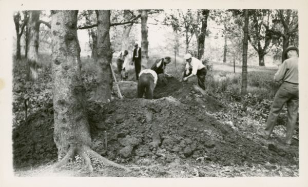 Students digging into a bird effigy mound on the University of Wisconsin campus on May 31 through June 1, 1935.