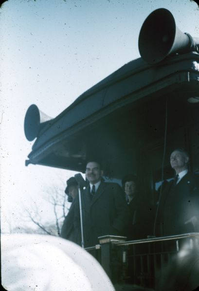 View from crowd of Governor Thomas A. Dewey of New York, the Republican Party presidential candidate, aboard the campaign train.