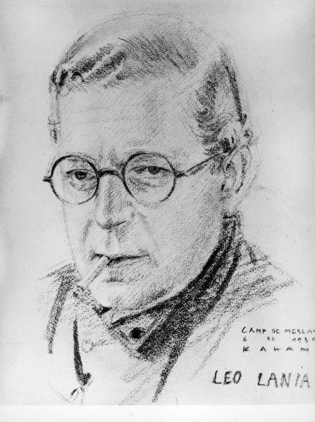 Head and shoulders portrait of Leo Lania (born Lazar Herrmann), wearing round eyeglasses. He has a cigarette in his mouth.