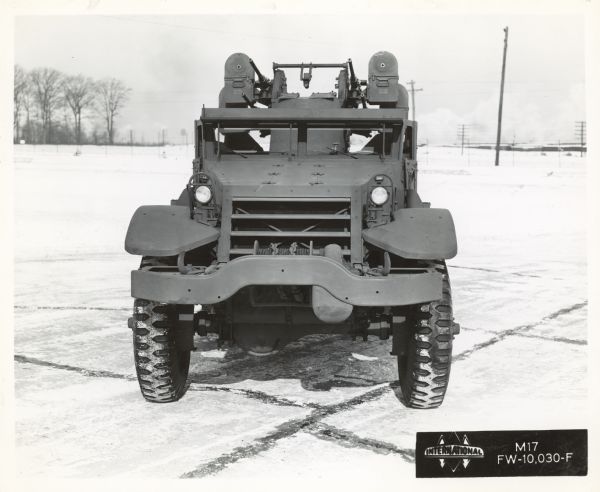 View from front of an International Harvester half-track parked outdoors.