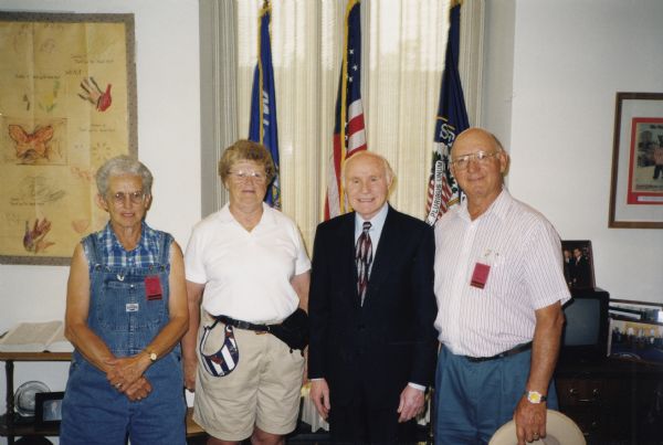 Bill Casper (right) and his wife, Kathy (left), standing with U.S. Senator Herb Kohl in his Capitol office. The Caspers visited Kohl as part of the 1998 Smithsonian Folklife Festival where Casper’s iconic Green Bay Packers ice shanty was on display. Casper’s sister, Mary Lou Schneider (far left), attended the festival as well, demonstrating sturgeon decoy carving.