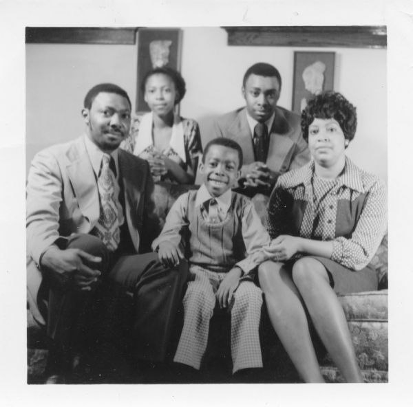 Dr. Joseph Carpenter, assistant professor of Afro-American Education & Philosophy at the University of Wisconsin-Milwaukee, is seated with his family. His wife, Ethel, is sitting on the right, with their younger son, Richard, in the center. Standing behind them are his daughter Brenda, and his older son, Martin. This image accompanied his 1973 campaign for a seat on the Milwaukee School Board.