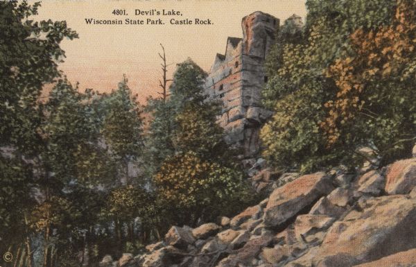 Castle Rock at Devil's Lake, number 4801 in E.A. Bishop's Wisconsin State Park Series. Caption on back of postcard reads: "Our State Parks now rank among the foremost parks of the continent. They are visited annually by thousands of tourists not only from Wisconsin, but from all over the United States. There is nothing this side of Yellowstone to compare with them in wonder and beauty. Devil's Lake is about one-half mile in width and more than a mile in length; it is surrounded by high picturesque rock formations, some of which resemble faces, some animals, while others remind us of the ruins of some old deserted castle."