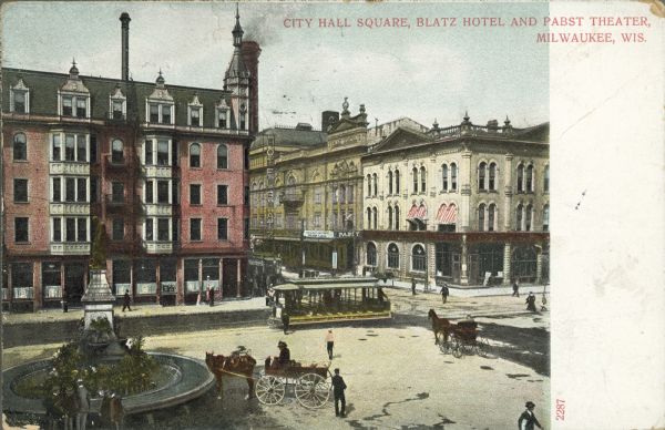 Elevated view from City Hall Square, including the Blatz Hotel, Pabst Theater, a fountain, and a streetcar. Caption reads: "City Hall Square, Blatz Hotel and Pabst Theater, Milwaukee, Wis."