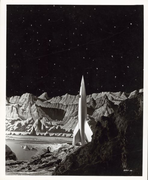 Still from the film 1950 film "Destination Moon." The rocket ship is sitting on the lunar landscape.