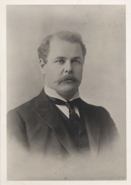 Quarter-length portrait of Harry L. Russell.