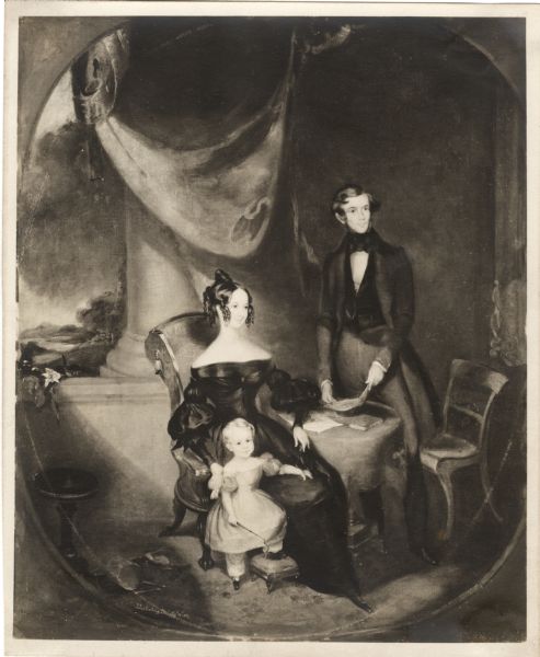 Photograph of an 1837 painting of Crawford Livingston, Sr., his wife and son. The painting was the work of John Livingston Harding. Murray K. Keyes photographed the painting in New York, although the date of photography is unknown.

Crawford Livingston, Sr., lived from 1811 to 1847 and was the father of Crawford Livingston, Jr., founder of Forest Lodge. In the painting, Crawford is standing next to a table and holding a document. His wife, Caroline, is seated next to him. His eldest son, Francis, is standing in front of Caroline.