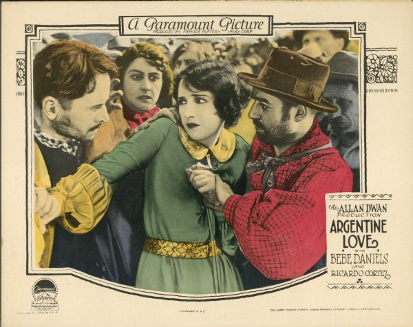 Lobby card for the 1924 film "Argentine Love" starring Bebe Daniels and Ricardo Cortez. The woman in the center has a look of fear on her face as people around her are grabbing her.