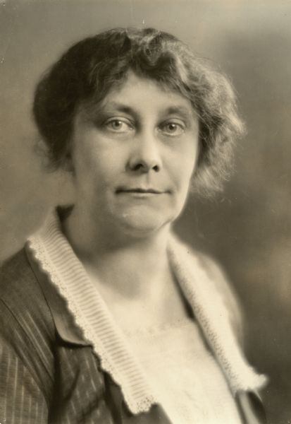 Quarter-length portrait of Elizabeth Yerxa. She was a passionate defender of social welfare programs, especially related to children, and was the director of the juvenile department of the state board of control in the 1920s and 1930s, and then director of the state Division of Child Welfare in the 1940s. In 1947, she spoke against a proposed bill that would allow police to send children as young as 14 to jail. 