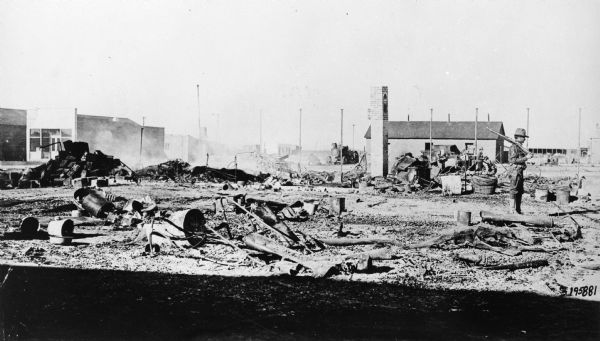 Ruins of the Commercial Hotel in Columbus, New Mexico, destroyed in a raid by Pancho Villa and his men from Mexico. The ruins are guarded by a soldier.
