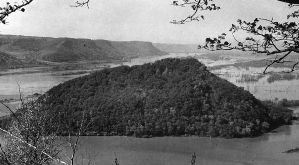 Caption reads: "Perrot State Park (Trempealeau vicinity), Wis. Mount Trempealeau, as seen from Brady's Bluff. View looking west. Photo by the Wisconsin Conservation Department, negative (?) no. 2681."