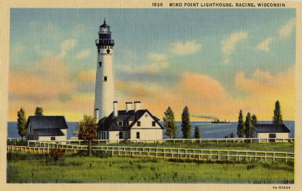 "Colortone" postcard view of the Wind Point Lighthouse, along with two other buildings. A fence surrounds the buildings, and in the distance a steamship is on Lake Michigan. Caption reads: "Wind Point Lighthouse, Racine, Wisconsin."