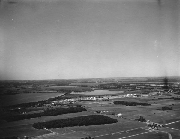 Aerial view of the town of McFarland, with Lake Waubesa in the background.