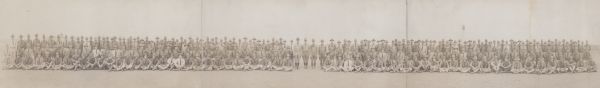 A panoramic group portrait of a military unit at Camp MacArthur.