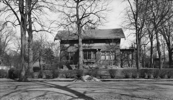 View across street towards the Lakewood-Curtiss House at 82 Cambridge Road.