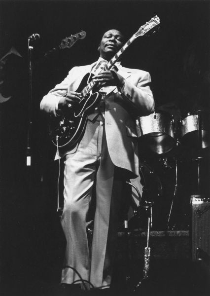 Musician B.B. King playing his guitar "Lucille" in concert.