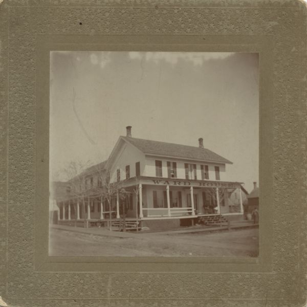 Exterior view of the Ward House from across the street. The Ward House was built in 1872 by F.H. Ward.