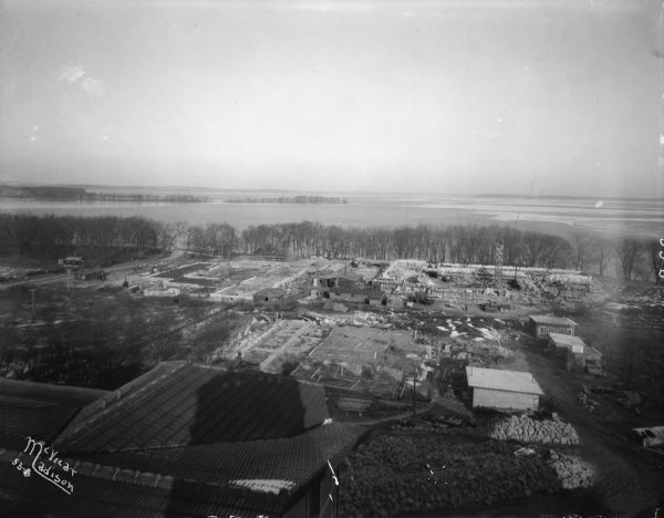 Elevated view of the Van Hise Dormitories under construction: Adams, Tripp, Carson Gulley Commons, and a view of Picnic Point, at the University of Wisconsin.