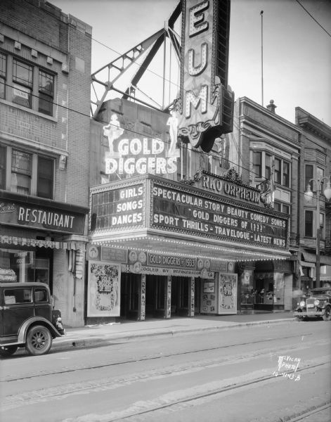 "Gold Diggers of 1933" on Orpheum Theater marquee, 216 State Street.  The entrance to Weber's Restaurant is on the left side of the theater.