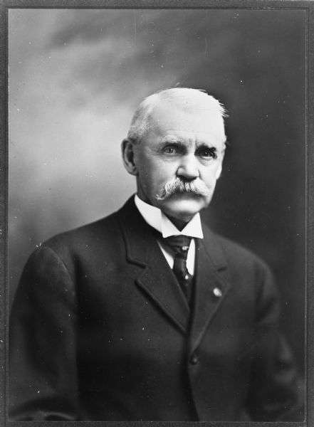 Quarter-length studio portrait of George Byron Merrick (1841-1931) of the 30th Wisconsin Infantry.