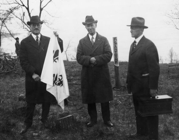 From left to right are E.D. Rounds, W.W. Bartell, and Joseph Schafer. They were participants in a reenactment of a ceremony in which Nicolas Perrot claimed the territory of the upper Mississippi River for France at Fort St. Antoine.