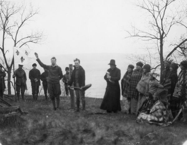 Actors taking part in a reenactment of a ceremony in which Nicolas Perrot claimed the territory of the upper Mississippi River for France at Fort St. Antoine. 