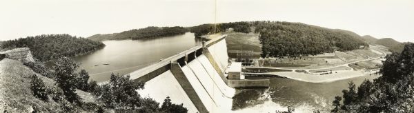 Elevated, panoramic view of the Norris Dam from the west side of the Clinch River. 