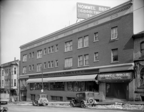 Hommel Brothers Store, 103-11 N. Hamilton Streeet, and the Town Apartment building, 115 N. Hamilton Street.
