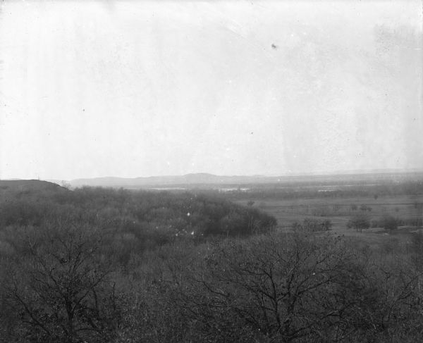 Elevated view. Caption on negative sleeve reads: "Black Hawk Battlefield. Wis. Heights. 'Looking it of west across river' [<i>sic</i>] c. 1896. Mrs. Charles N. Brown Estate."