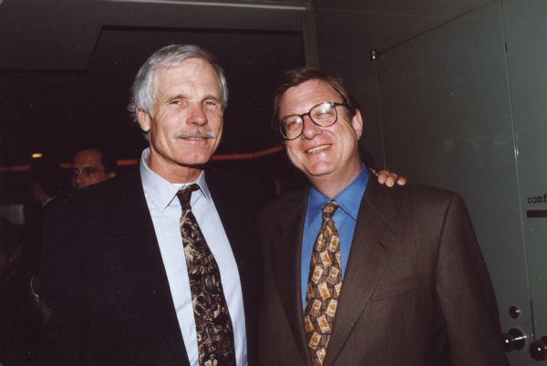 Jeff Greenfield and Ted Turner.