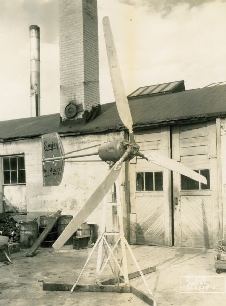 View of complete EMJAY wind generator unit set up in front of the M.J. Fitzgerald factory, 2034 Jenifer Street.
