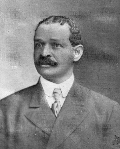 Quarter-length portrait of Lucian (or Lucien) H. Palmer. Text with negative reads: "Hon. L.H. Palmer, member of the St. Mark's AME Church. He was the first black elected member of the Wisconsin Assembly (1906). Represented 6th District of Milwaukee. From a church pamphlet loaned for copying by Lorraine Ragland, Los Angeles, 1977, titled 'The First 35 Years of the St. Mark's AME Church.'"