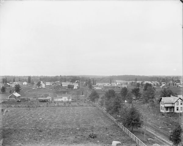 A north-facing elevated view of Iola, with Main Street to the right.
