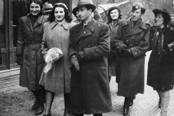 Louis Koplin (center) and friends after attending a wedding at the Altneu Schul; Praque, Czechoslovakia.