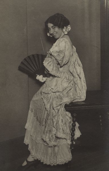 Portrait of opera singer, Olivia Monona (Olivia Goldberger) in costume for <i>Carmen</i>.