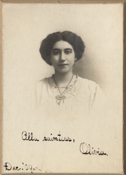 Bust portrait of Olivia Goldenberger (later known as Olivia Monona) at the time of her graduation from the University of Wisconsin at the age of 20. It is inscribed: "Alla saintess, Olivia."