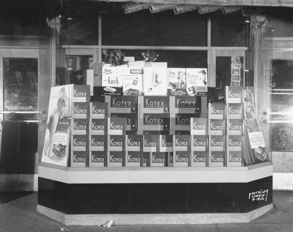Carlson's 5 cent to $1.00 Store, Union Corners, 2524 East Washington Avenue, show window displaying Kotex.
