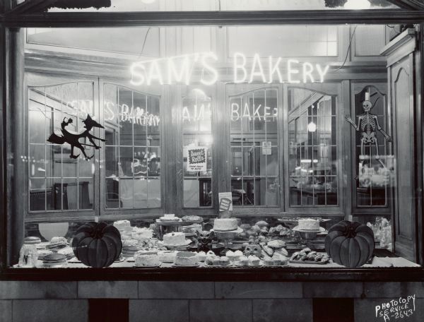 Halloween display in the window of Sam's Bakery, 735 University Avenue.