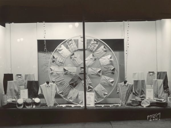 Hills Department Store, 202 State Street at Dayton Street, with a window display of men's sport shirts.