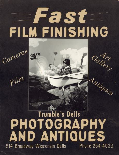 Advertisement for John Trumble's photography studio which, at the time, also included an art gallery and a store for camera supplies and antiques. The poster includes an original black-and-white photograph of a man (John Trumble) sitting in a flying bathtub. Dressed like the flying ace with a leather helmet, goggles and scarf, he is turning a hand crank for the front propeller with one hand and holding up a toilet plunger with the other. The bathtub is flying over a rural scene of agricultural fields and a duck is flapping its wings as if to stop midair to avoid running into the propeller. 

The bathtub scene is one of several humorous backgrounds designed by Trumble for creating fun customer portraits. 