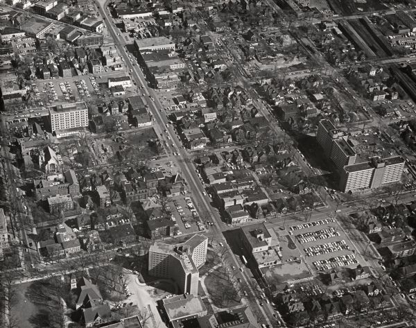 Aerial view showing University Avenue running diagonally from top to bottom. Chadbourne Hall at the intersection of University and N. Park Street is at bottom. Sellery Hall is at right on E. Johnson Street. State Street runs parallel to University at left.