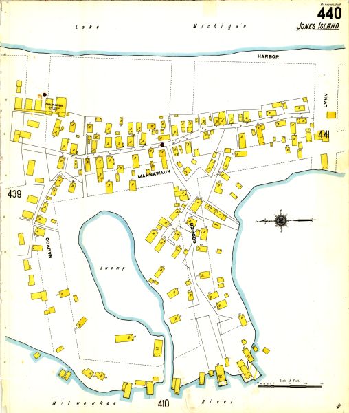 Sanborn insurance map of Milwaukee showing a portion of Jones Island with Lake Michigan at the top and the Milwaukee River at the bottom.