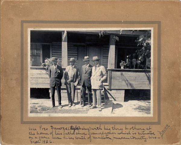 Vice President Charles Dawes (right) and his three brothers are standing in front of their father's and grandfather's home on a farm seven miles south of Mauston.