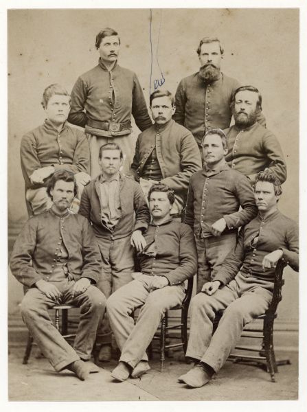 Group portrait made from a composite of 2 photoprints of Company I, first Wisconsin Volunteer Cavalry. Standing in back: M.P. Stone, Hiram Gee.  Next row: unidentified, John A. Read, and Amandus Barnes.  Next row: William Horton, Joseph Eschenbaugh. Front row: Henry P. O'Connor, Wilson and John Fransworth. Most of the men of the regiment were from Menomonie, Wisconsin.
