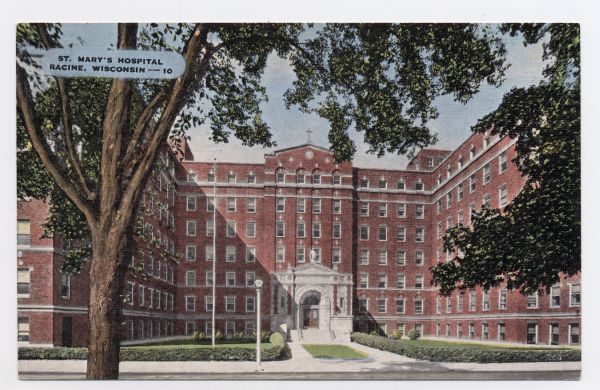 Exterior view of St. Mary's Hospital at 16th Street and Grand Avenue. Caption reads: "St. Mary's Hospital, Racine, Wis."