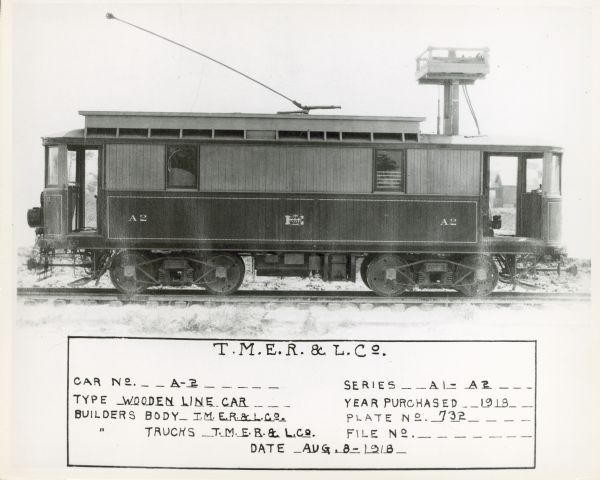 A wooden line streetcar, number A-2, plate number 732. for The Milwaukee Electric Railway and Light Company (T.M.E.R. & L. Co.)