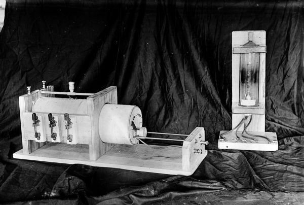 A radio transmitter tuner and vacuum tube. The tube was built by Cyril Moreau Jansky and the transmitter was most likely built by him as well.