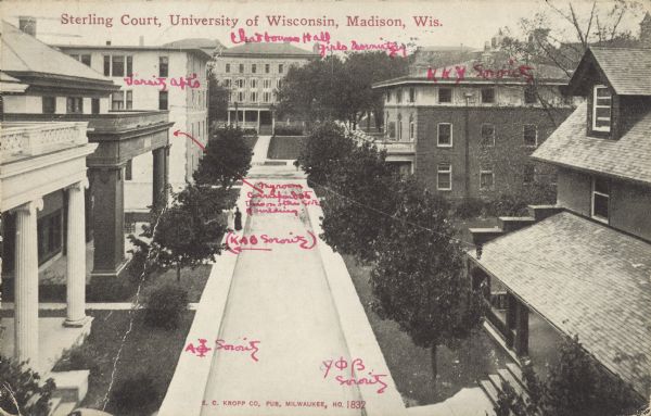 Elevated view of Sterling Court. Handwritten on postcard are Varsity Apt's, Chadbourne Hall girls dormitory, and sorority signs marking buildings along the street. Caption reads: "Sterling Court, University of Wisconsin, Madison, Wis."