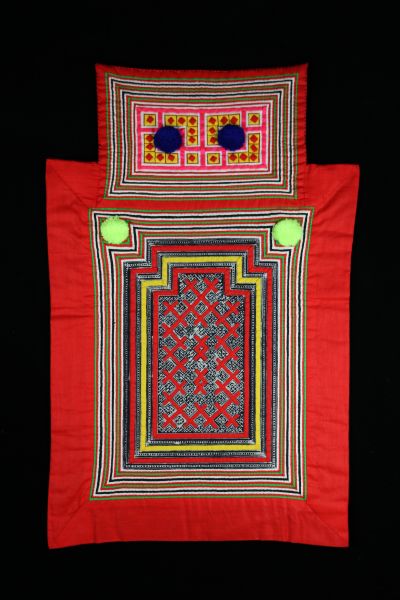 A colorful Hmong infant carrier.
